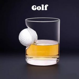 Handmade glass cup with golf ball design for whiskey and spirits.