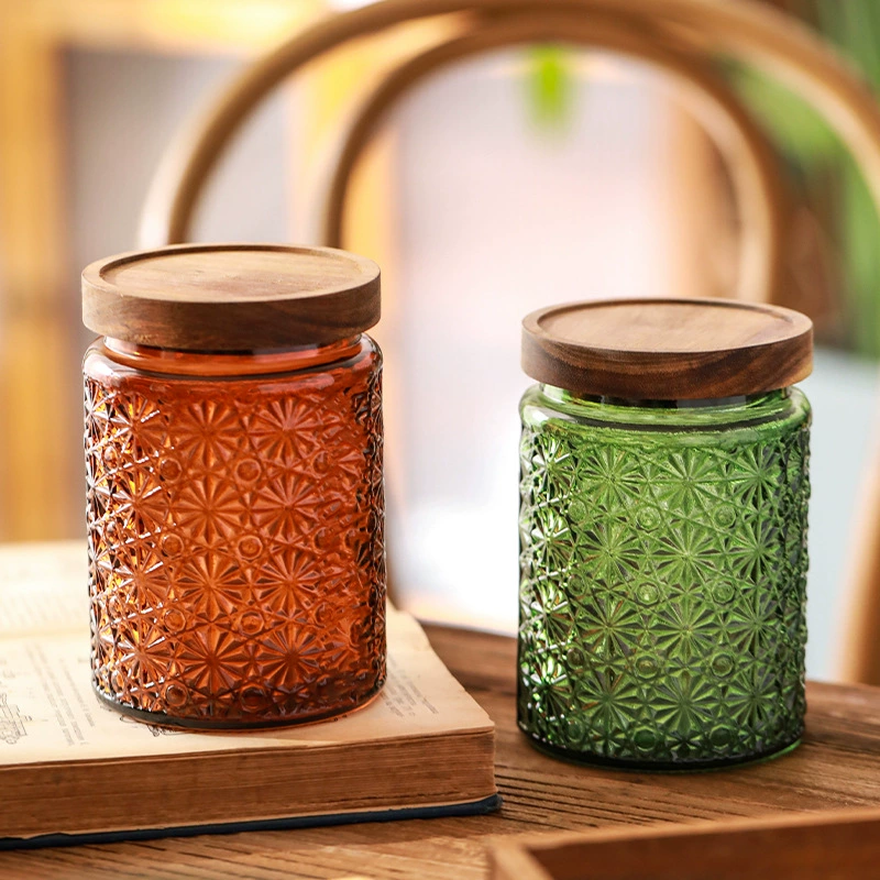 Handmade glass jars with intricate patterns, perfect for storage or decoration.