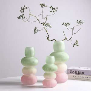 Handmade glass vases with ribbed gradient design by Zibo Bull Glassware Co., Ltd.