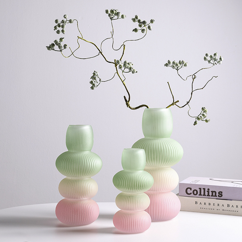 Handmade glass vases with ribbed gradient design by Zibo Bull Glassware Co., Ltd.