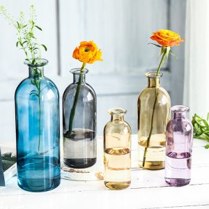 Handmade glass cups and vases from Zibo Bull Glassware Co., Ltd. featuring colorful, elegant designs.