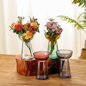 Handmade glass narrow neck vases with colorful floral arrangements, perfect for home decor.